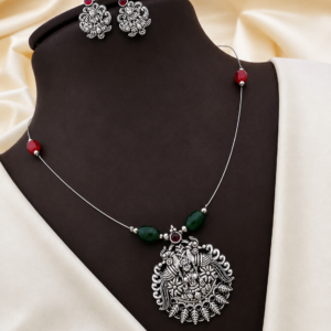 Traditional Oxidized Lakshmi Pendant Necklace Set with Matching Earrings | Red & Green Beads